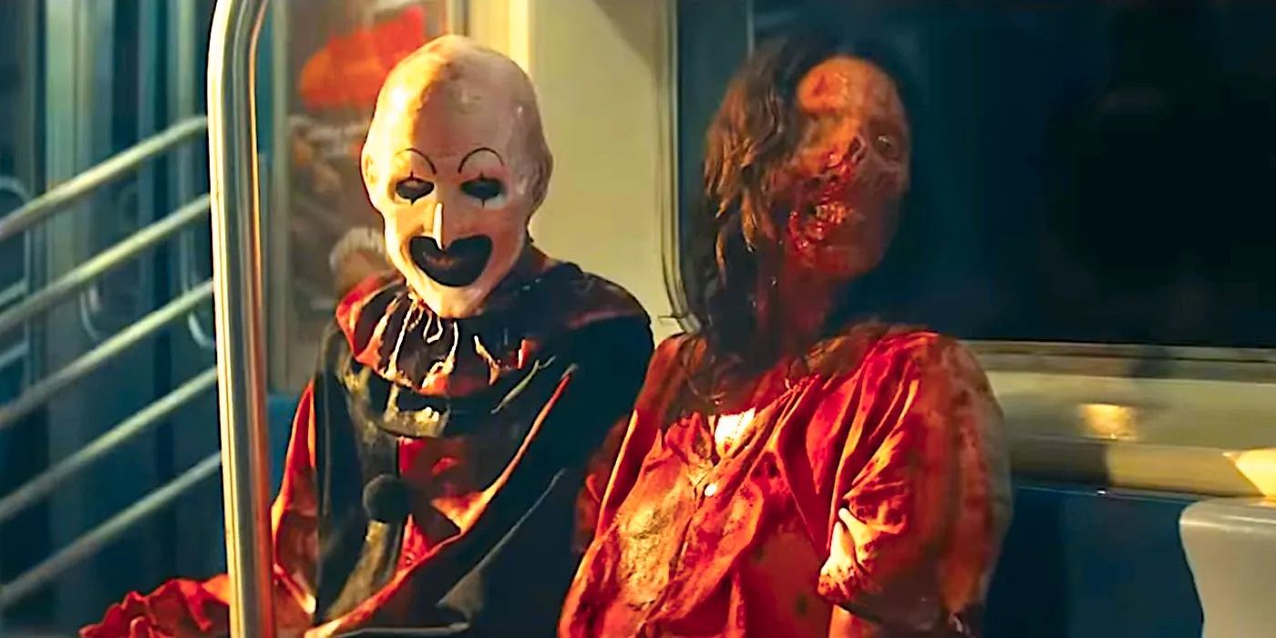 A bloodsoaked Art the Clown and Victoria sit on the subway in Terrifier 3 trailer. Image