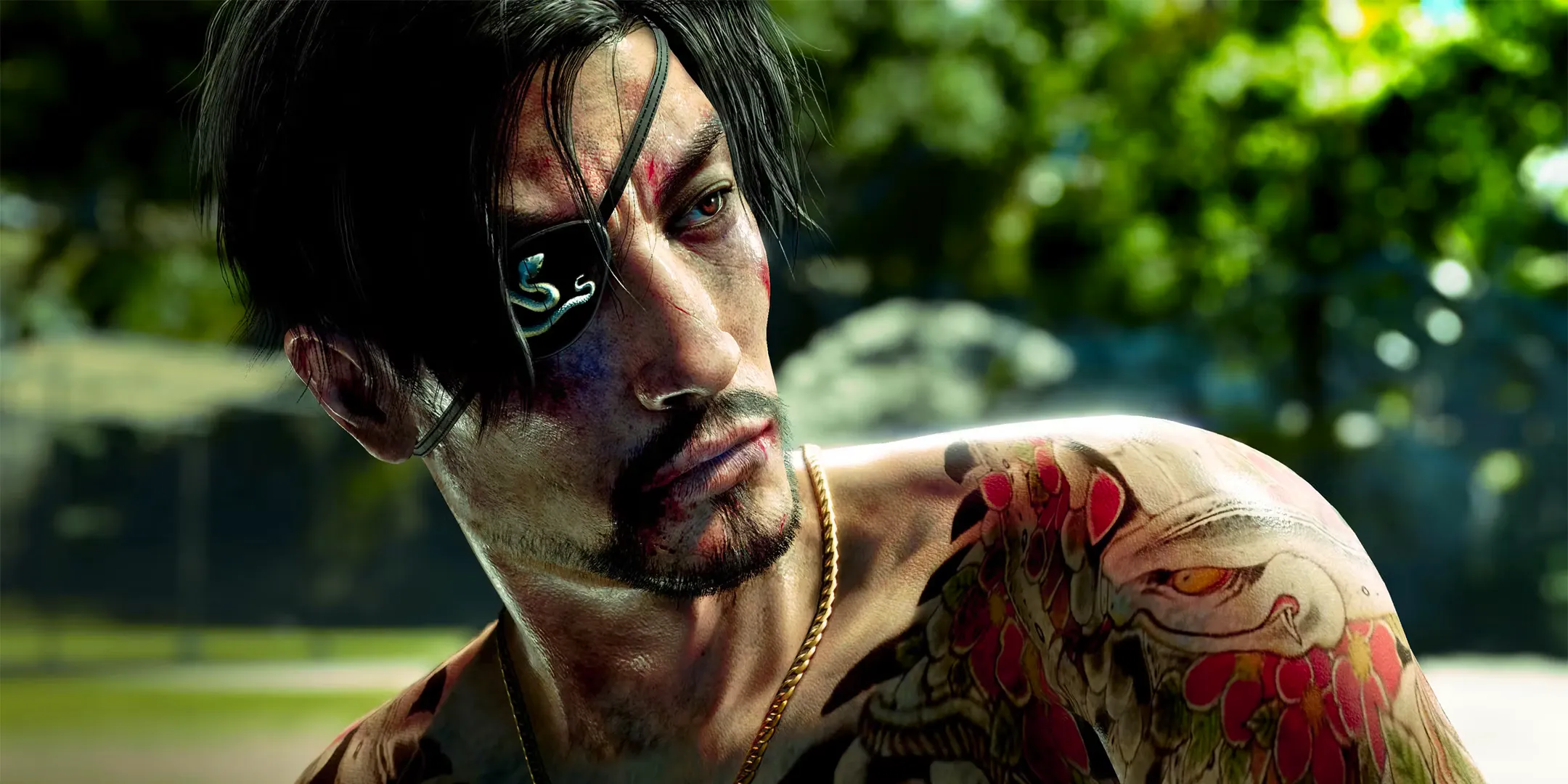 A close-up of a shirtless Goro Majima in Like a Dragon: Pirate Yakuza in Hawaii. Image