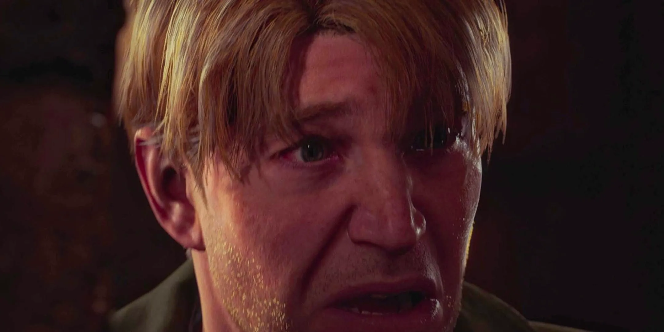 A close up of James from the Silent Hill 2 trailer looking distraught. Image