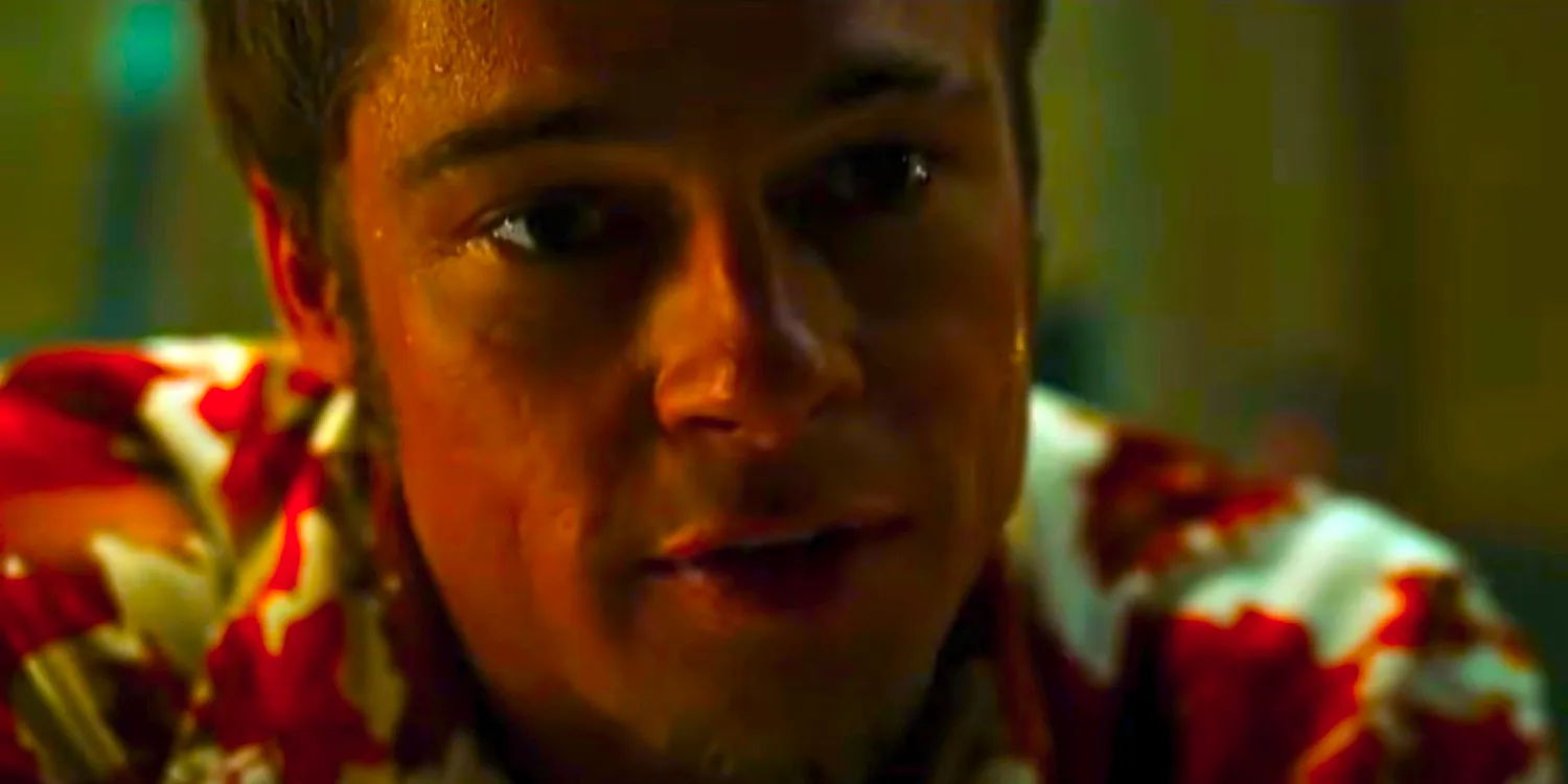 A closeup of Brad Pitt as Tyler Durden making his pitch in Fight Club Image