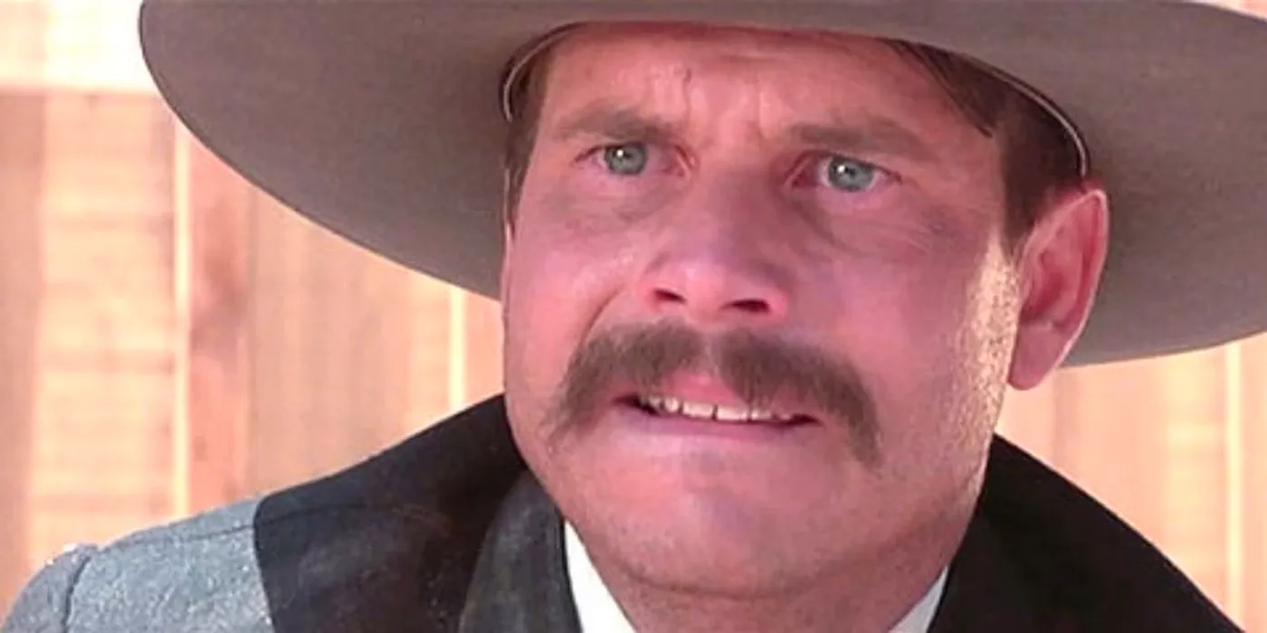 A distressed Morgan Earp looks up Image