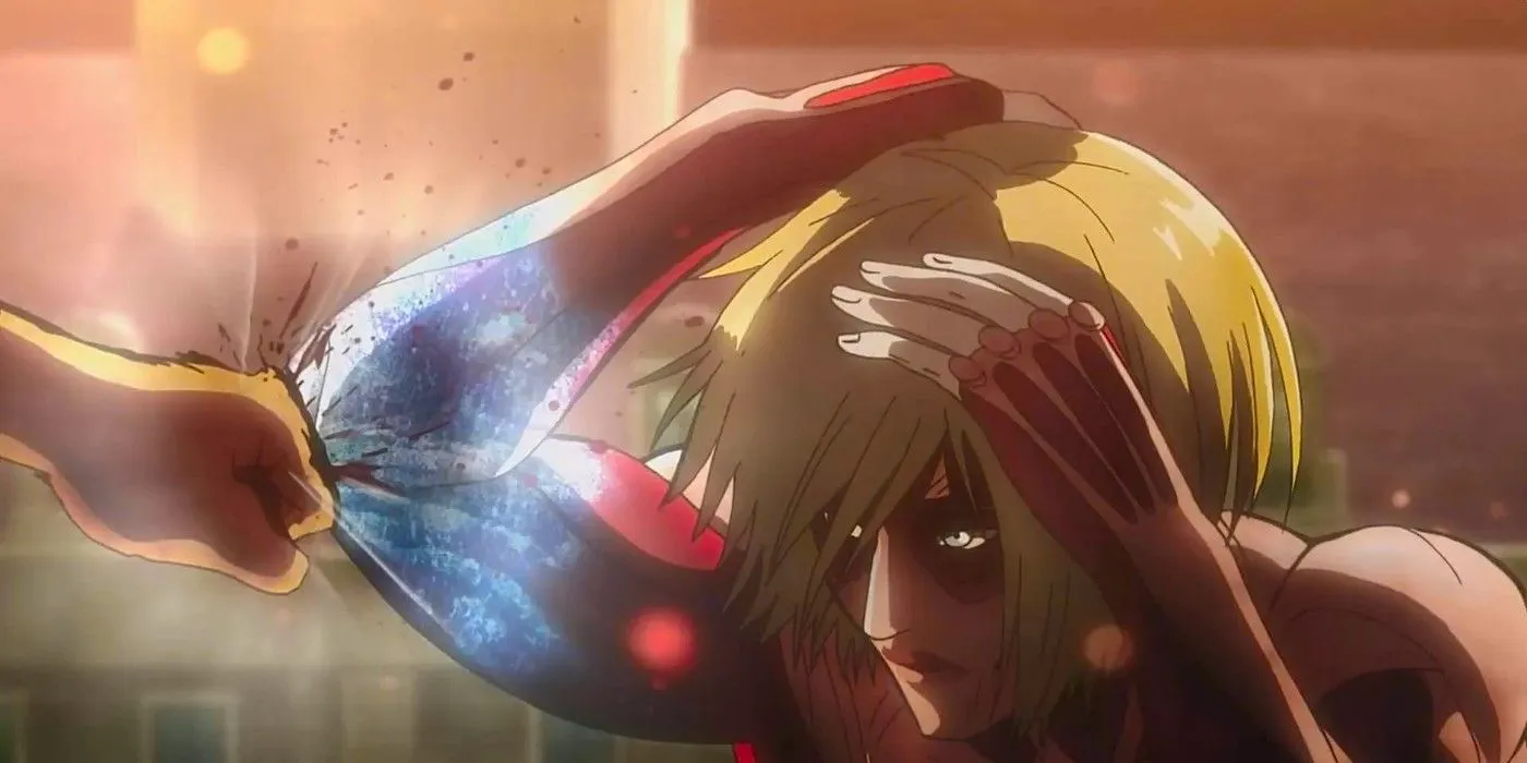 A female Titan blocks a punch in Attack On Titan  Image