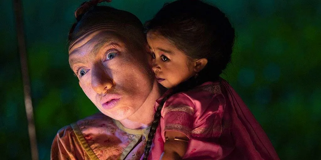 A man holding Ma Petite in American Horror Stories: Freak Show Image