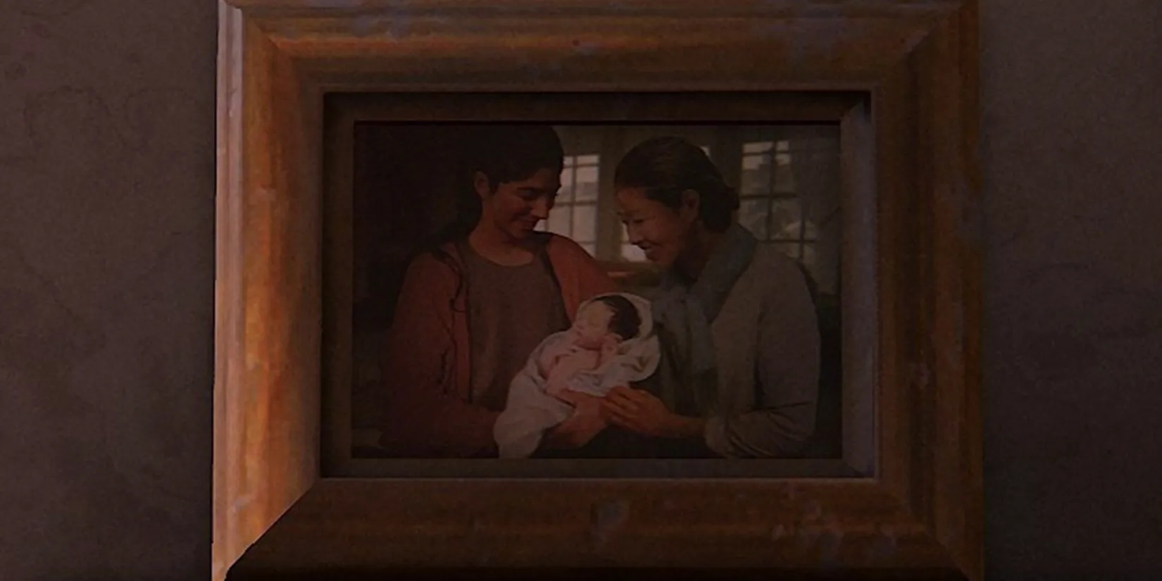 A photo of Dina, JJ, and Jesse's mom in The Last of Us Part II Image