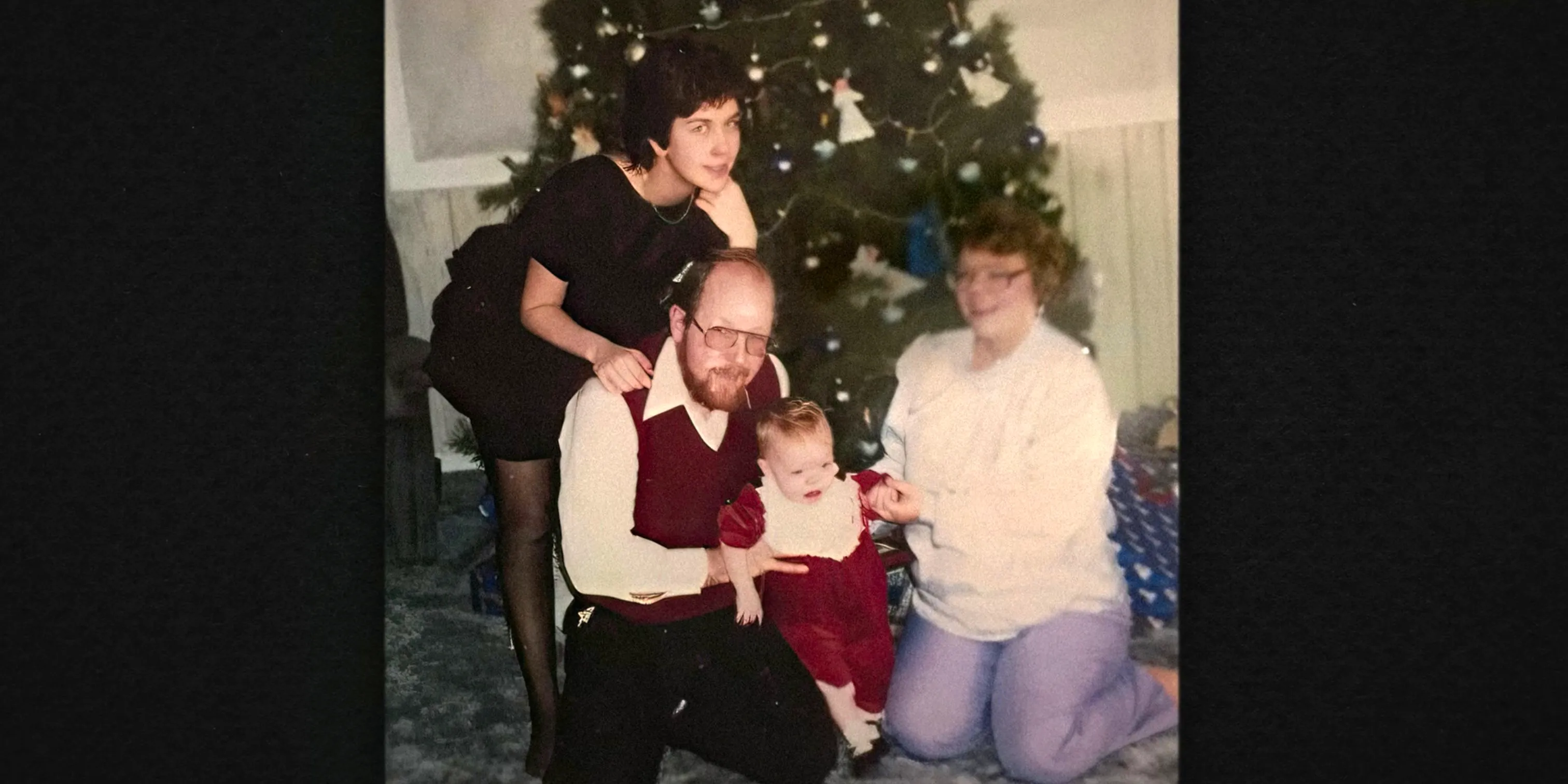 A Photograph Of The Bowman Family At Christmas In Netflix's Into The Fire: The Lost Daughter Image