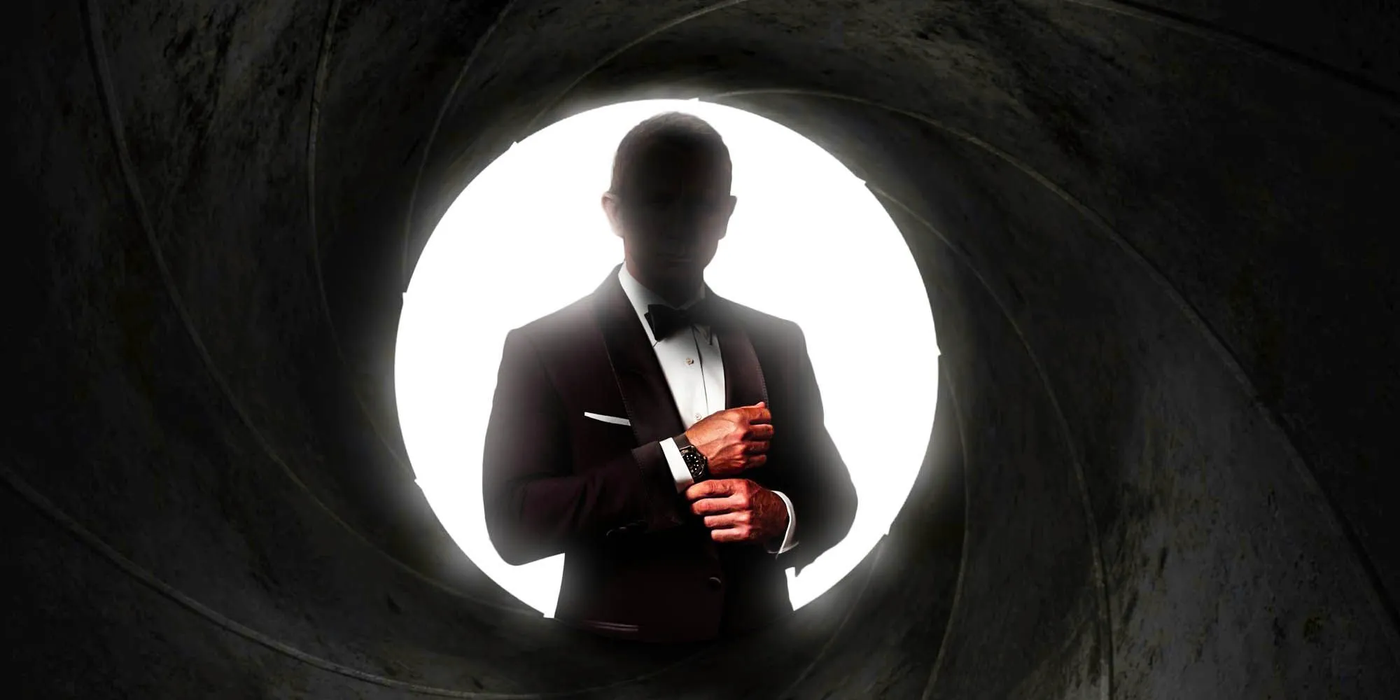 A picture of a faceless James Bond standing in the barrel of a gun from the James Bond franchise Image