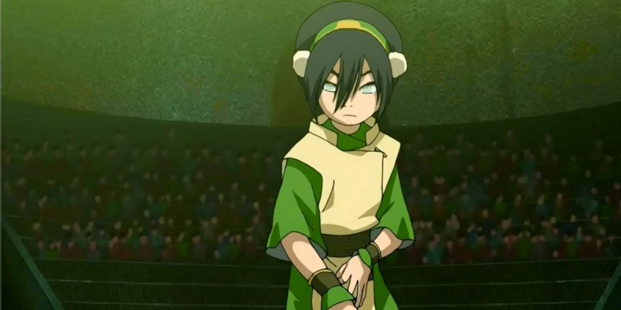 A profile of Toph in a ready stance from Avatar: The Last Airbender Image