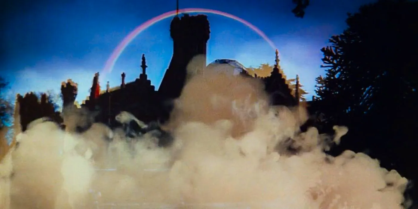 A rainbow is visible above the spaceship-castle as it prepares to take off in Rocky Horror Picture Show Image