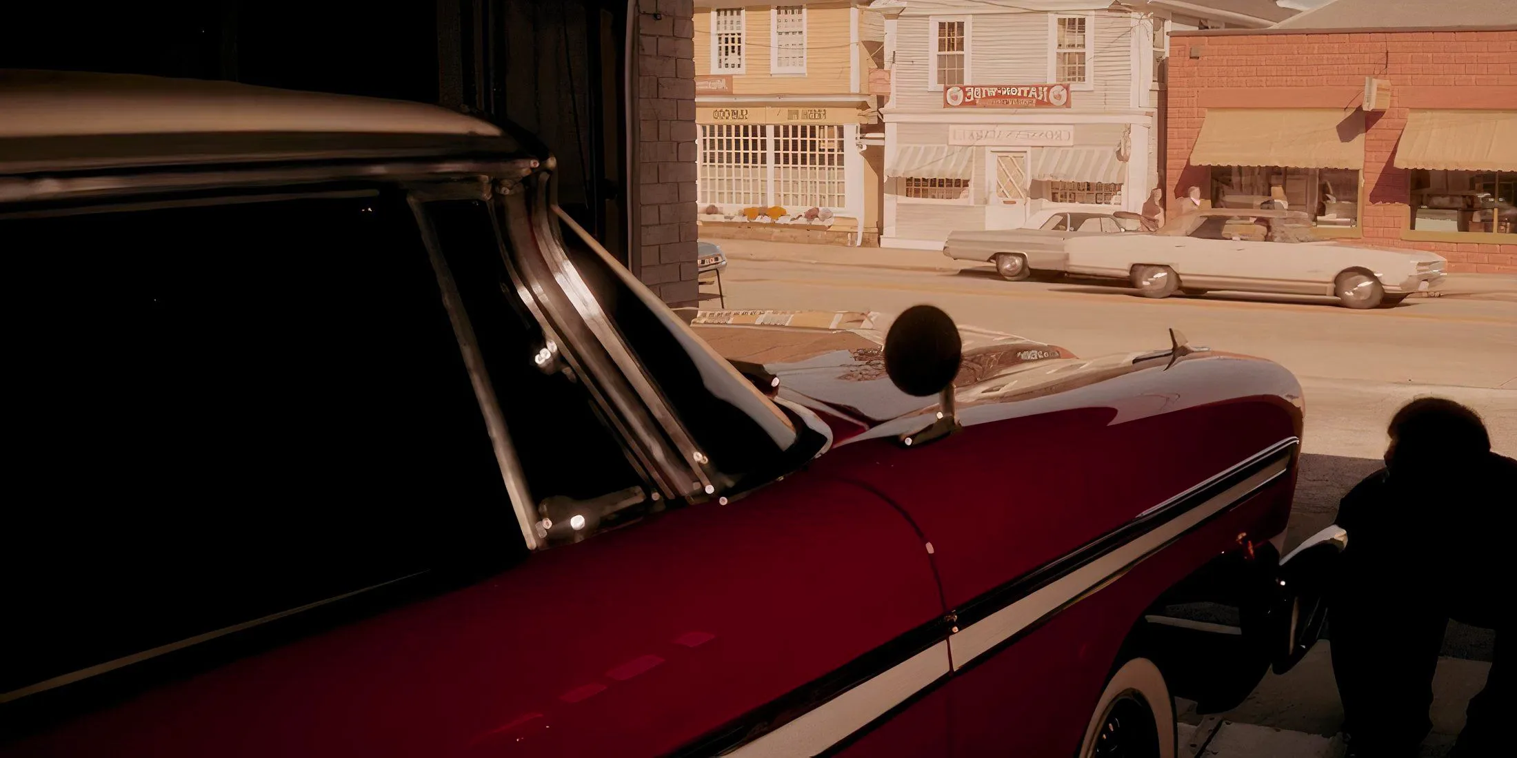 A screenshot in Salem's Lot 2024 of a red and white Plymouth Fury Image