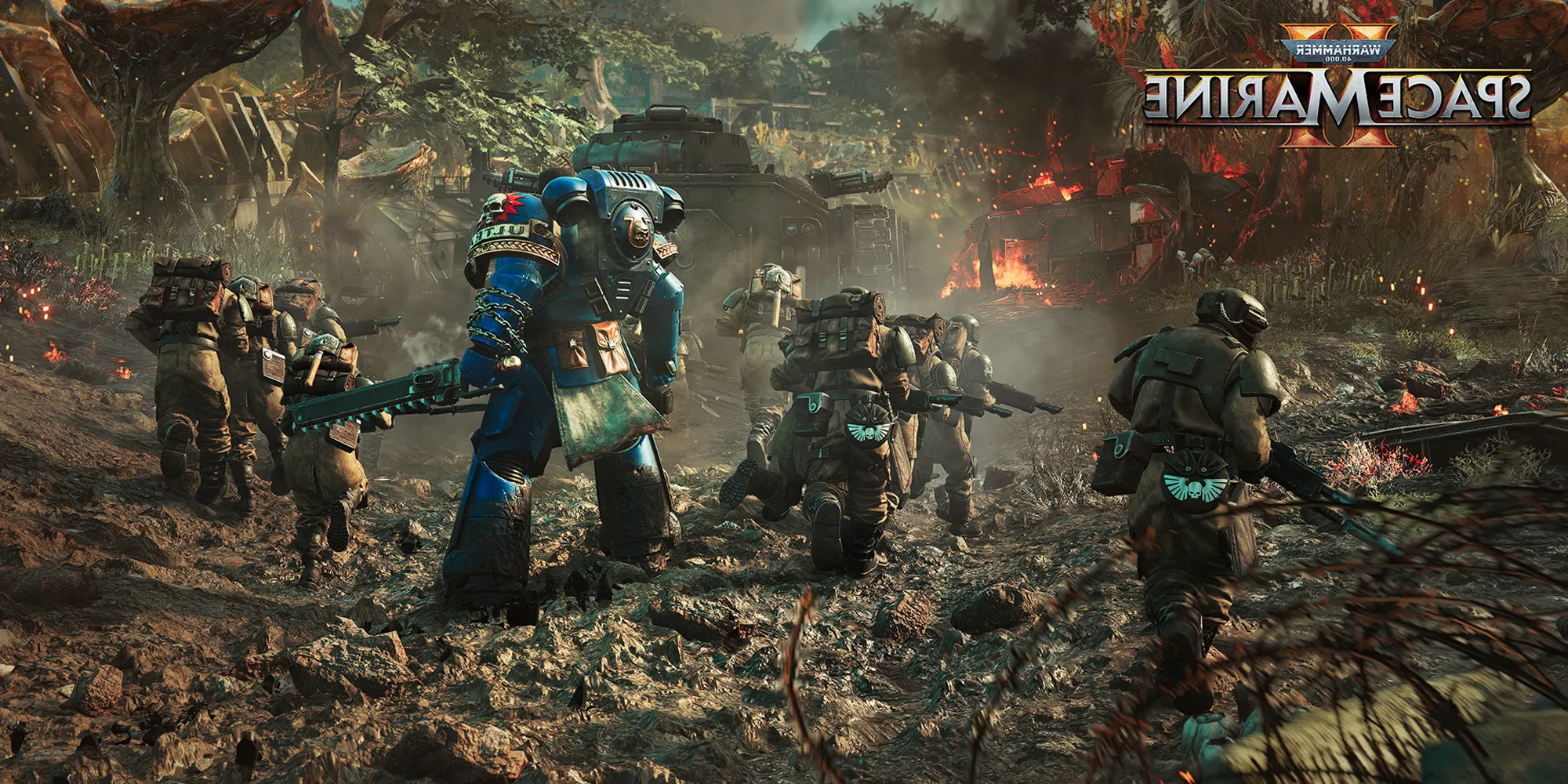 A Space Marine holding a chainsword while walking with guardsmen, all following a tank through a muddy battlefield. Image