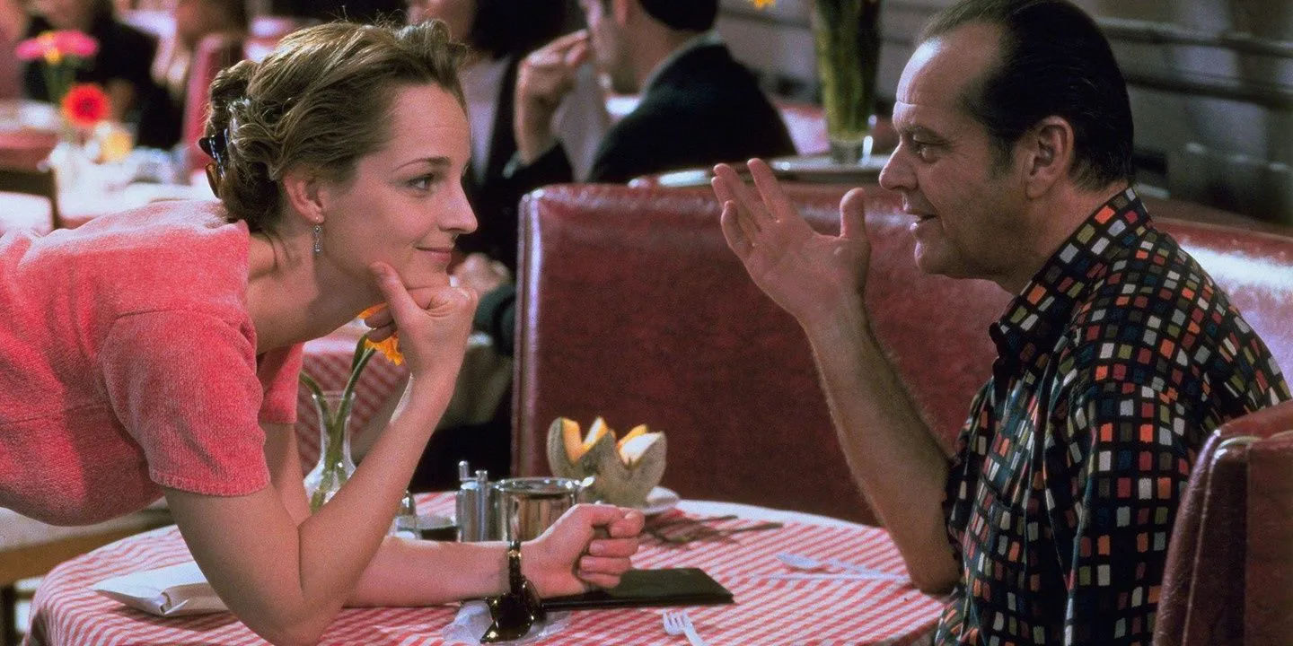 A still from As Good as it Gets with Melvin Udall (Jack Nicholson) conversing with Carol Connelly (Helen Hunt) at a diner table Image