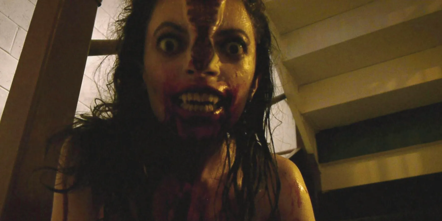 A woman sheds her skin to reveal a demonic monster in V/H/S Image