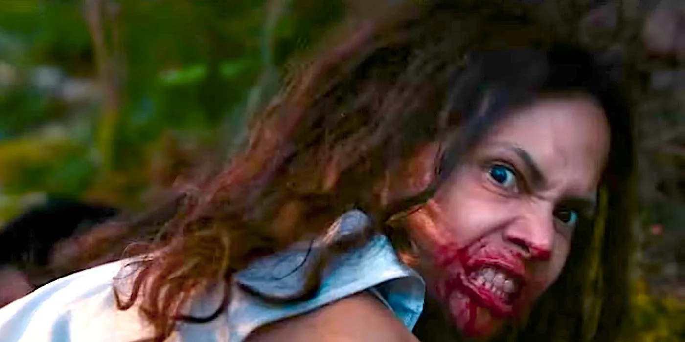 A woman with a blood-covered mouth snarls in Never Let Go's trailer Image