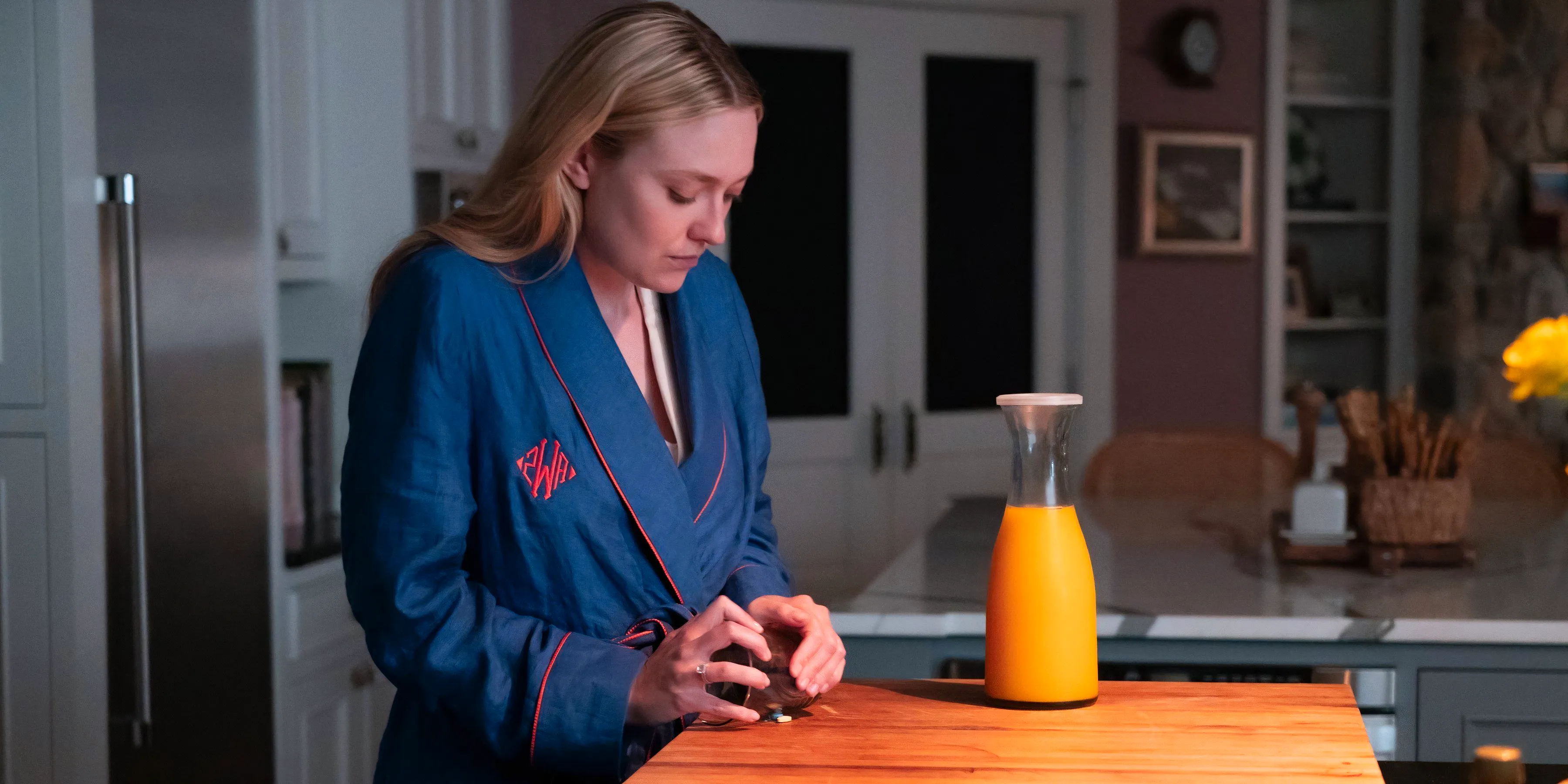 Abby crushes up pills to put in orange juice in The Perfect Couple Image