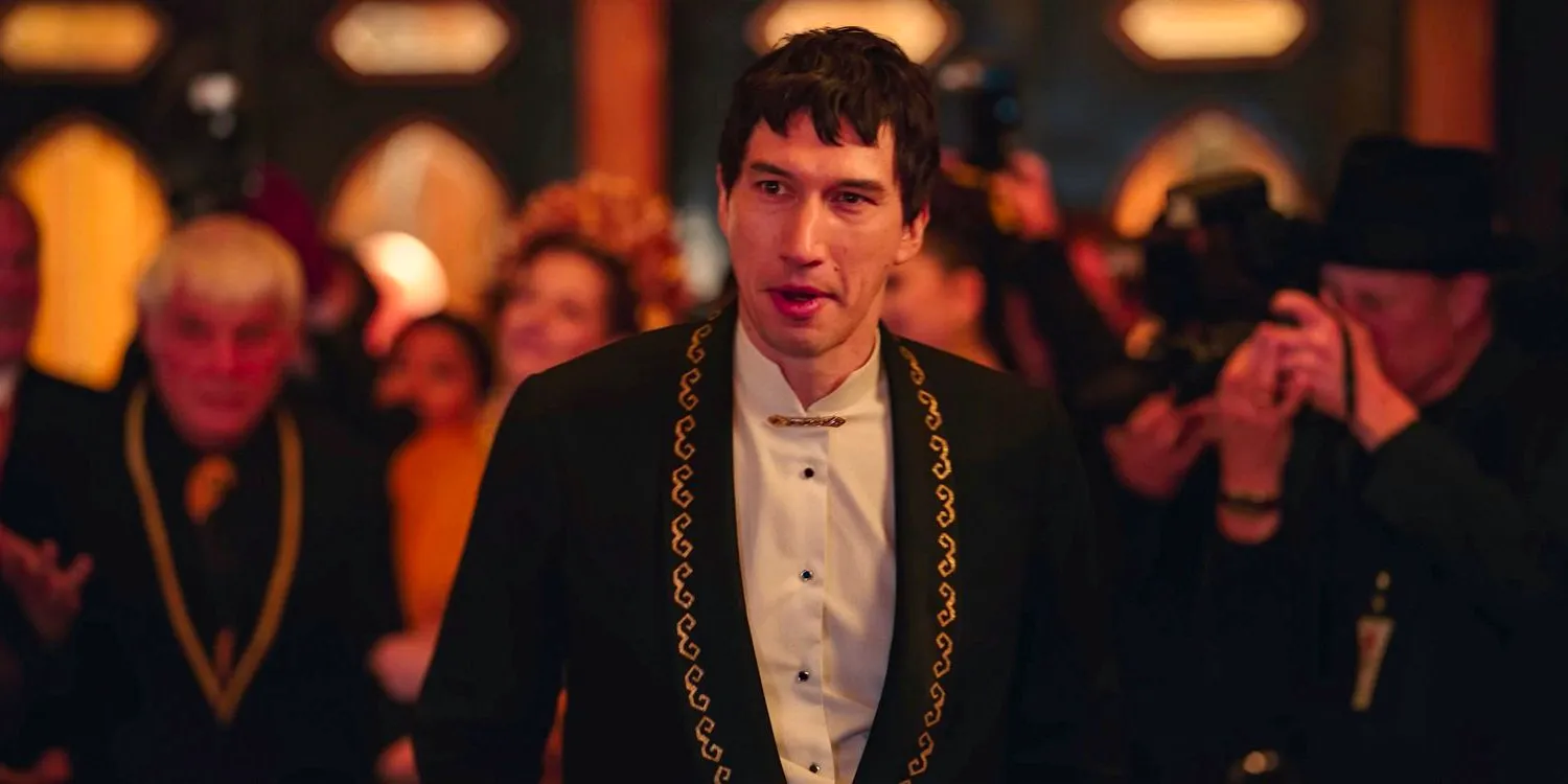 Adam Driver as Caesar Catilina, smiling and well-dressed, in Megalopolis Image