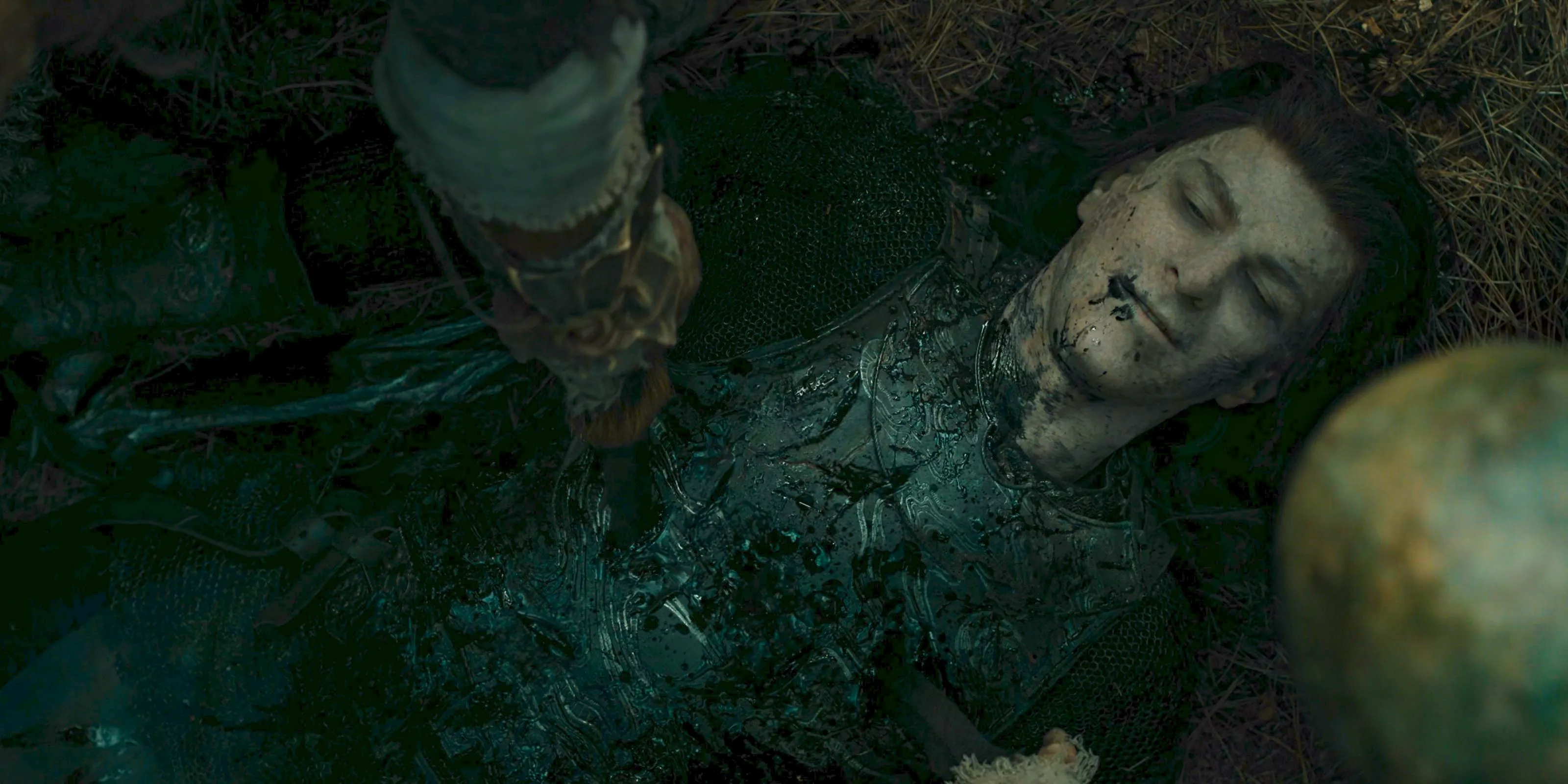 Adar (Sam Hazeldine) dead after being betrayed by his army of Uruks in The Lord of the Rings: The Rings of Power Season 2 Episode 8 Image