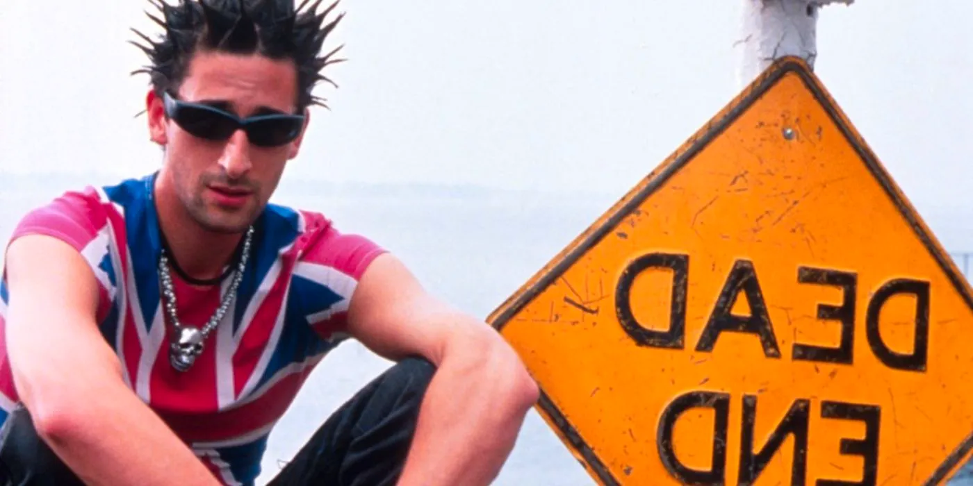 Adrien Brodie as Ritchie seated next to a dead end sign in a promotional still for Summer of Sam Image