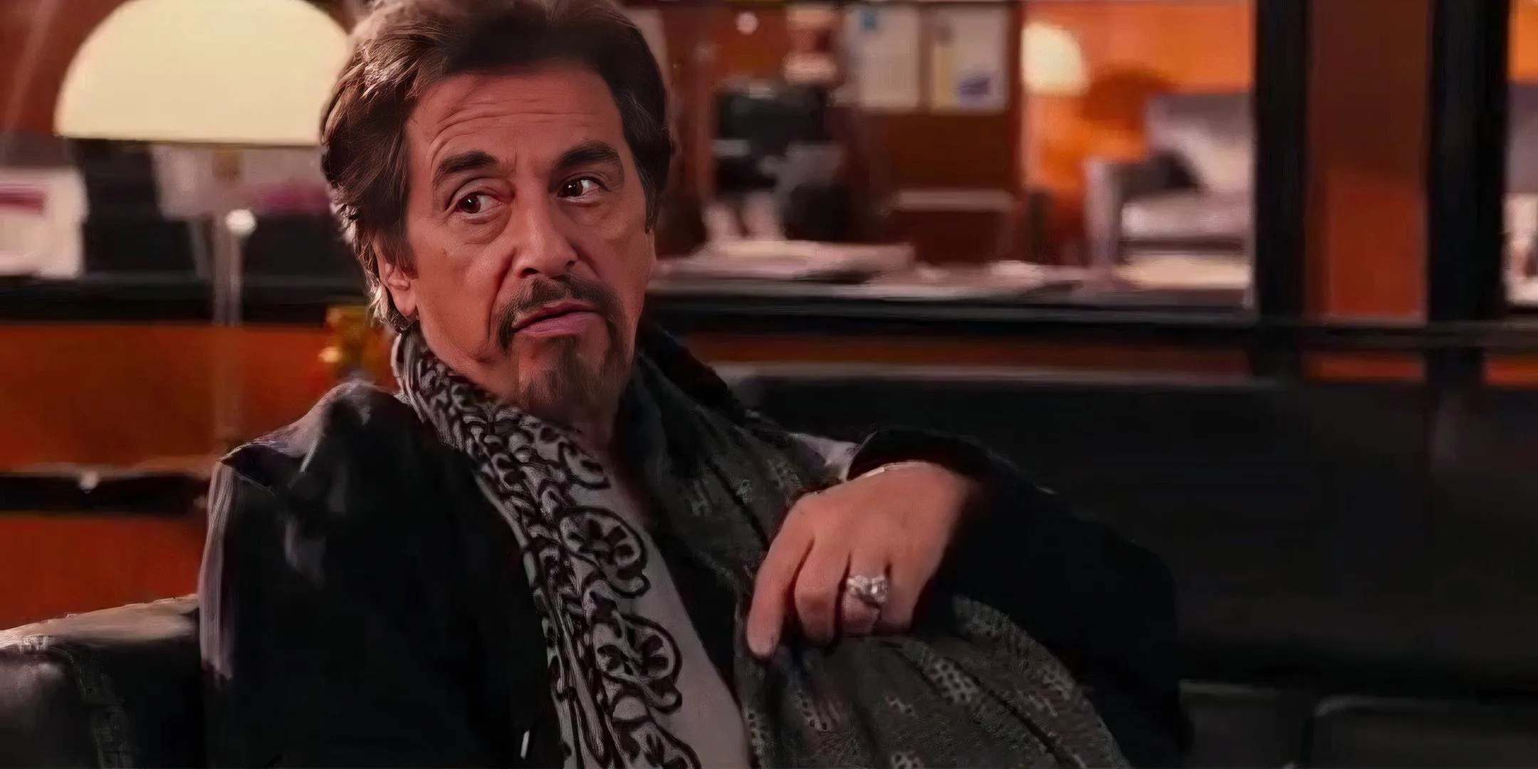 Al Pacino looking upset while talking to Adam Sandler in Jack and Jill Image