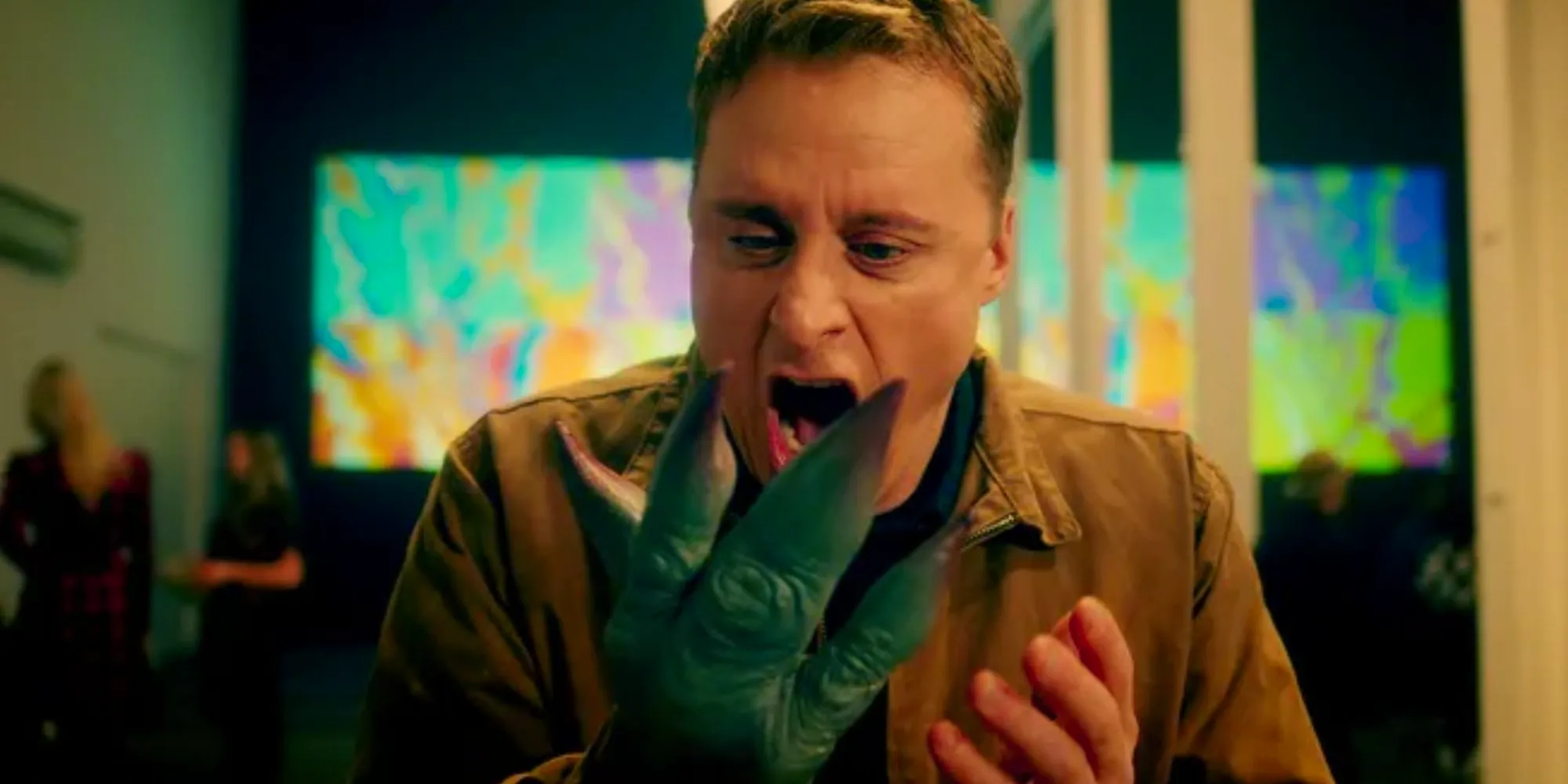 Alan Tudyk as Harry screaming at his alien hand in Resident Alien Image