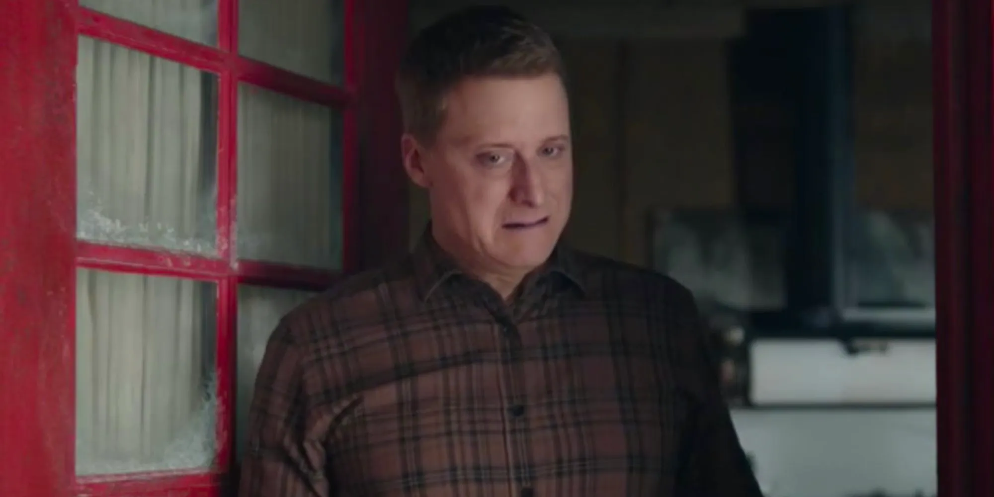 Alan Tudyk looking suspicious as Harry in Resident Alien Image