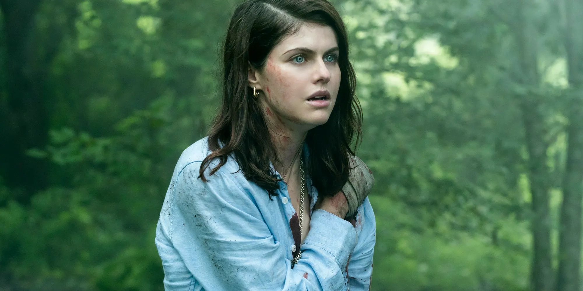 Alexandra Daddario as Rowan Mayfair in the woods in Mayfair Witches. Image