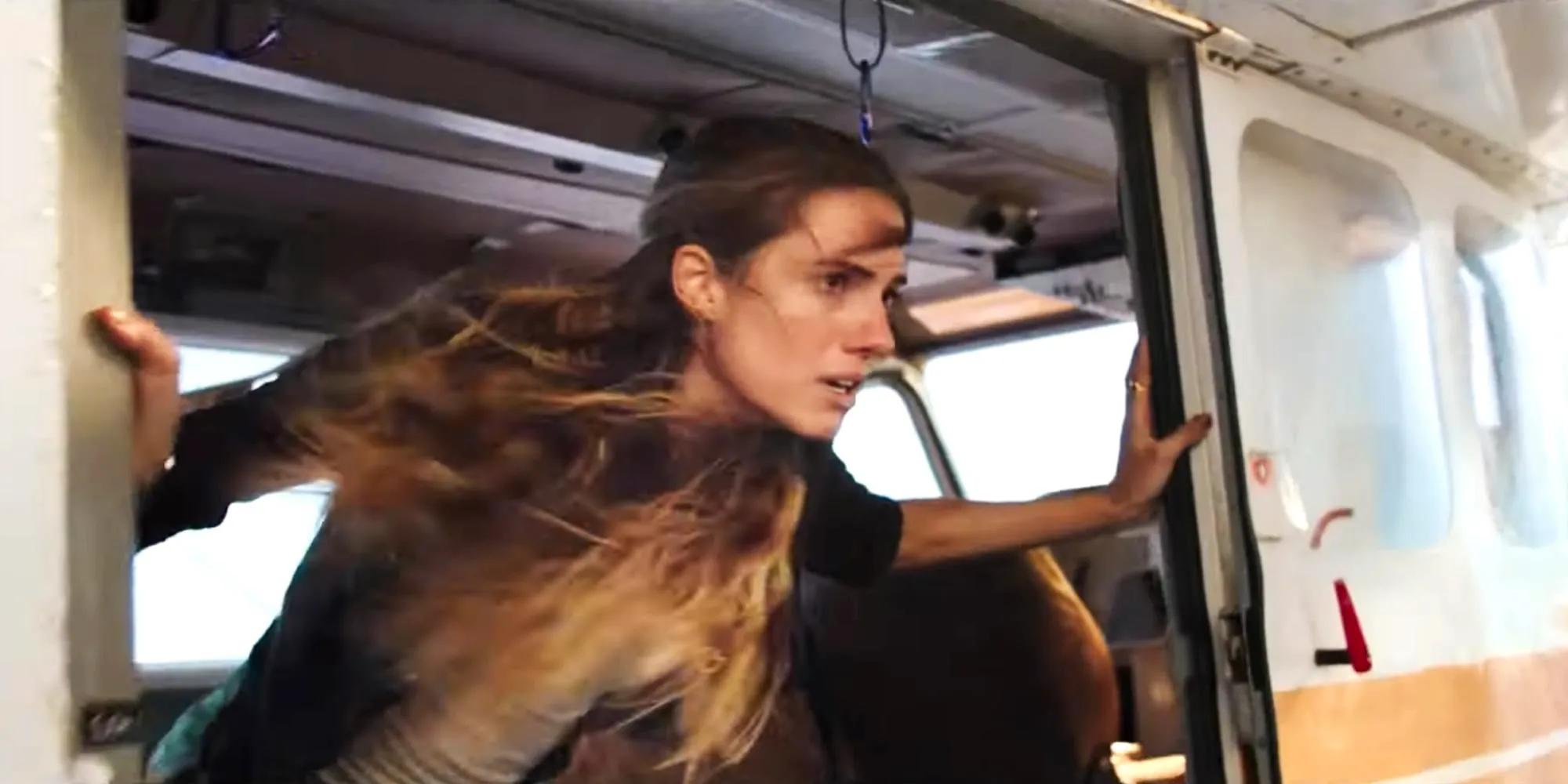 Allison Williams on a plane in Horizon Line  Image