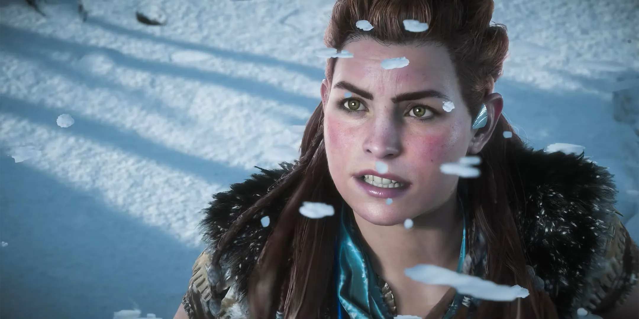 Aloy in a snowy field in Horizon Zero Dawn Remastered. Image