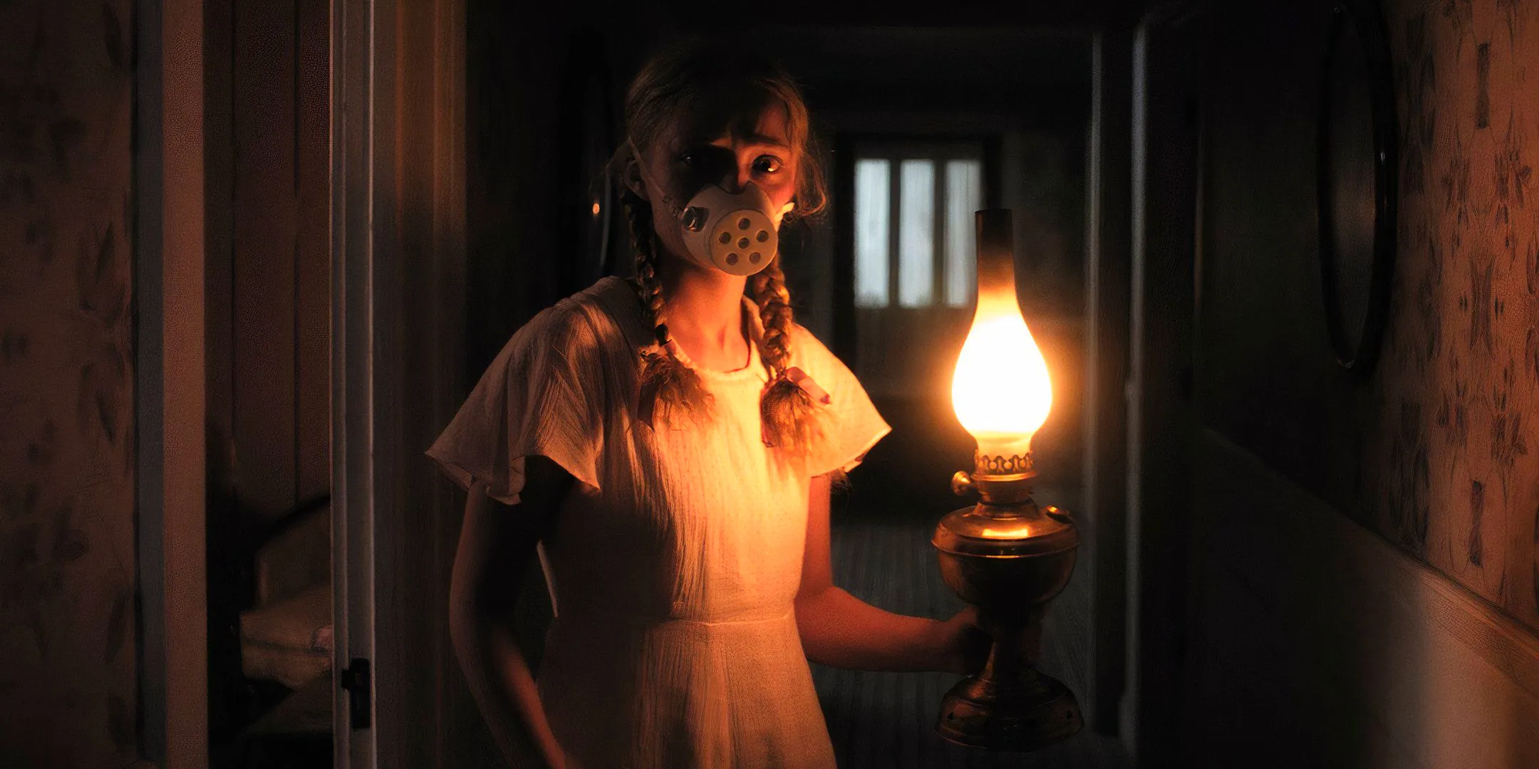 Amiah Miller as Rose looking afraid while wearing a mask and holding a lantern in Hold Your Breath Image