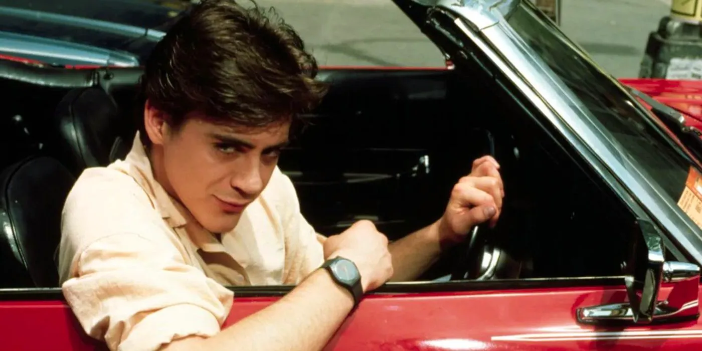 An old picutre of actor Robert Downey Jr. in a classic car Image