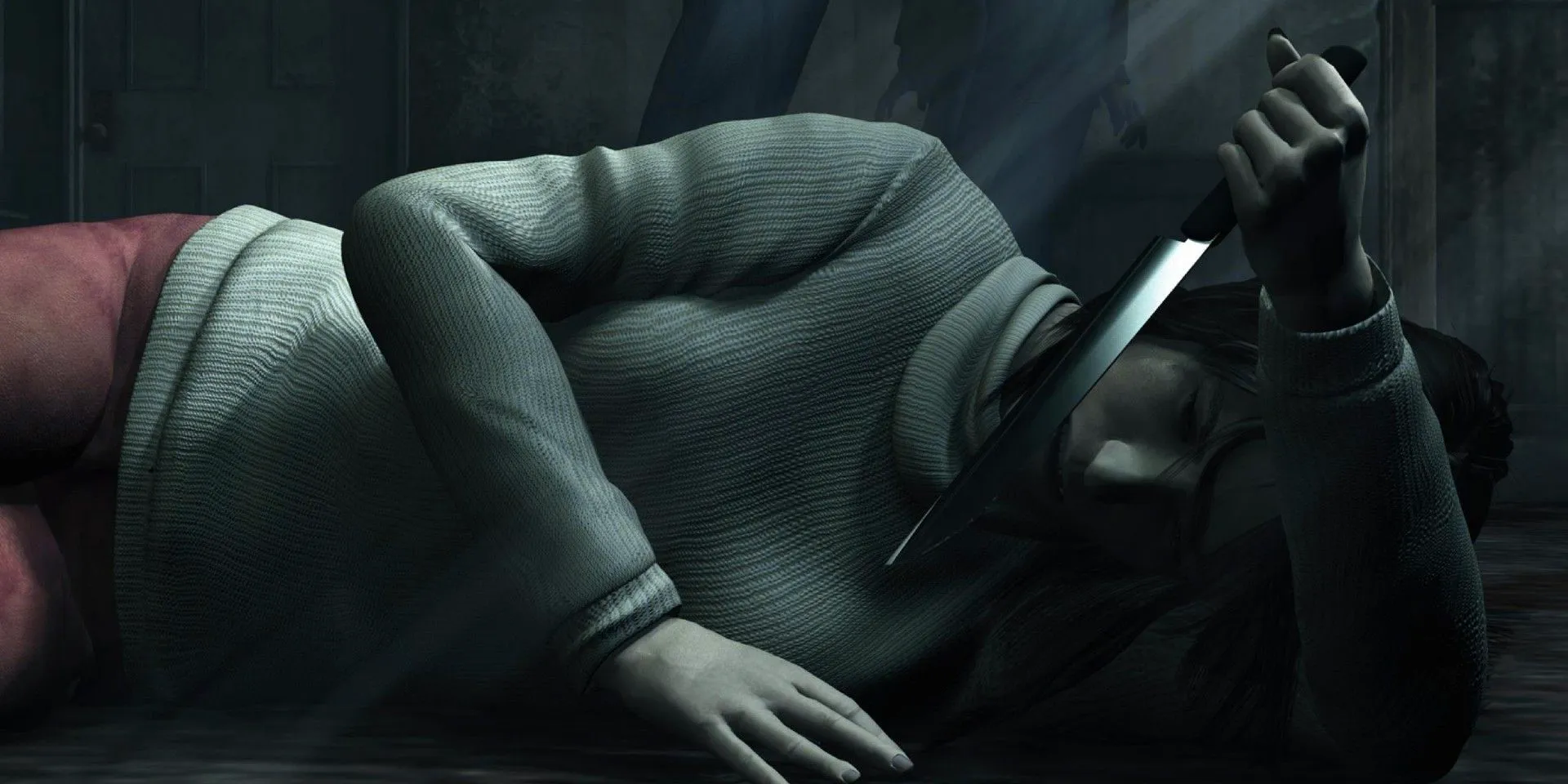 Angela lying on the floor and holding a knife in Silent Hill 2 Image