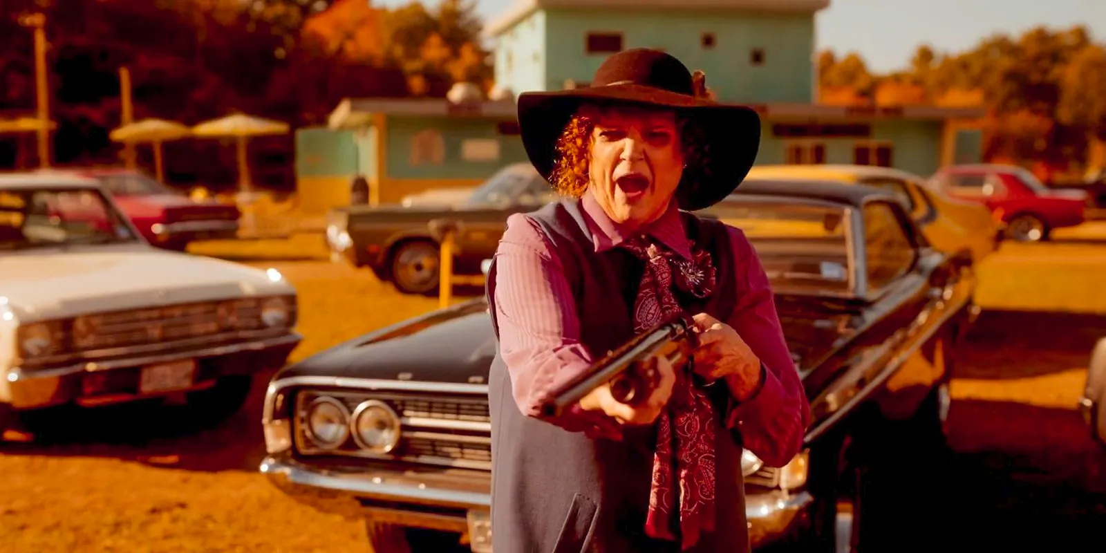 Ann Norton ( Debra Christofferson) shooting a rifle in Salem's Lot (2024) Image