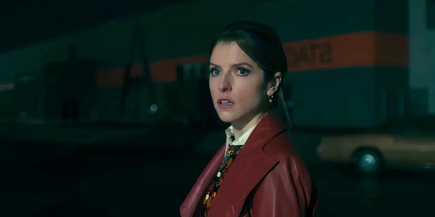 Anna Kendrick standing in a parking lot looking scared in Woman of the Hour Image