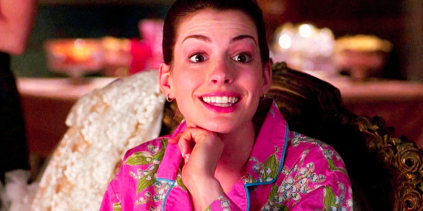 Anne Hathaway as Mia smiling with a hand to her chin in The Princess Diaries 2 Image