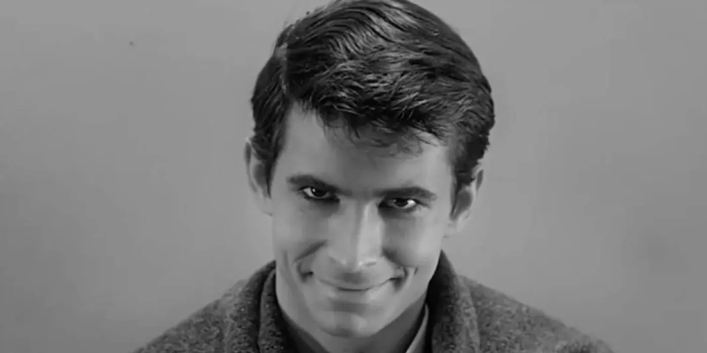 Anthony Perkins as Norman Bates smiling in Psycho  Image