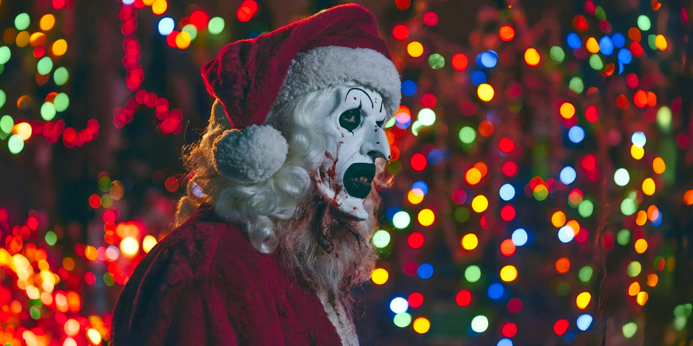 Art the Clown dressed as Santa in Terrifier 3 Image