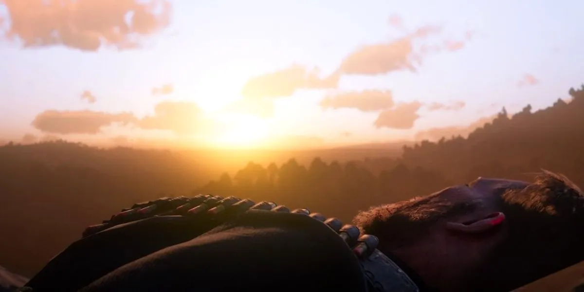 Arthur Morgan faces the sun as he lays dying Image