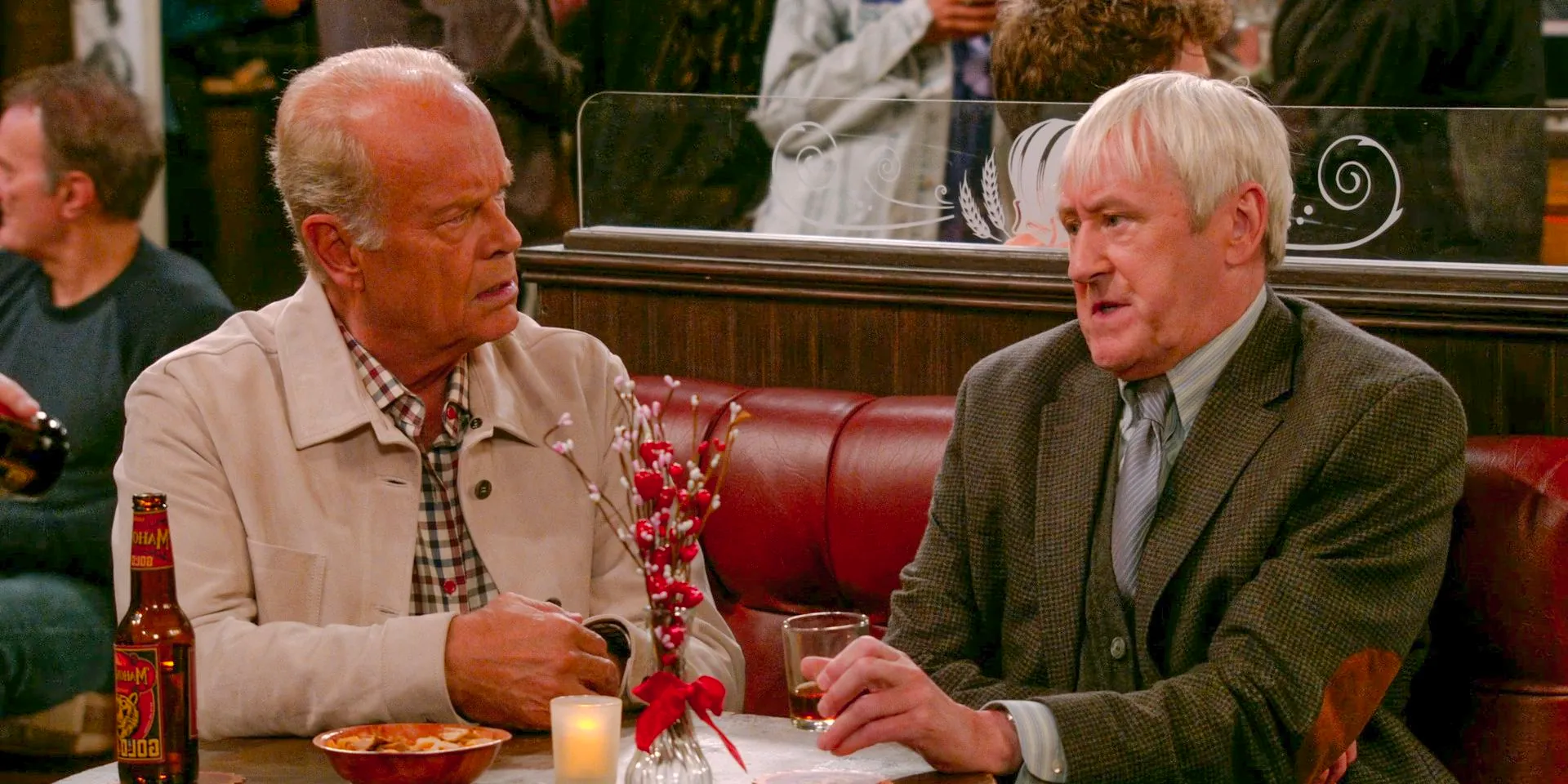 At the bar, Alan (Nicholas Lyndhurst) and Frasier (Kelsey Grammer) chatting in Frasier (2023) Season 2 Episode 2 Image