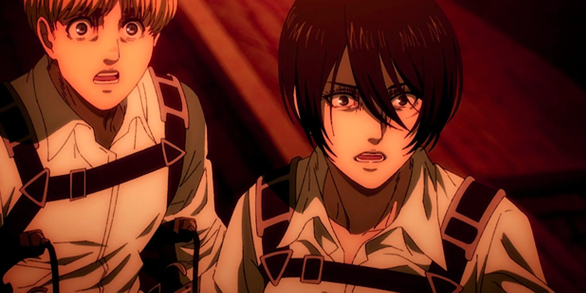 Attack on Titan's Mikasa and Armin react in shock to something just off screen. Image