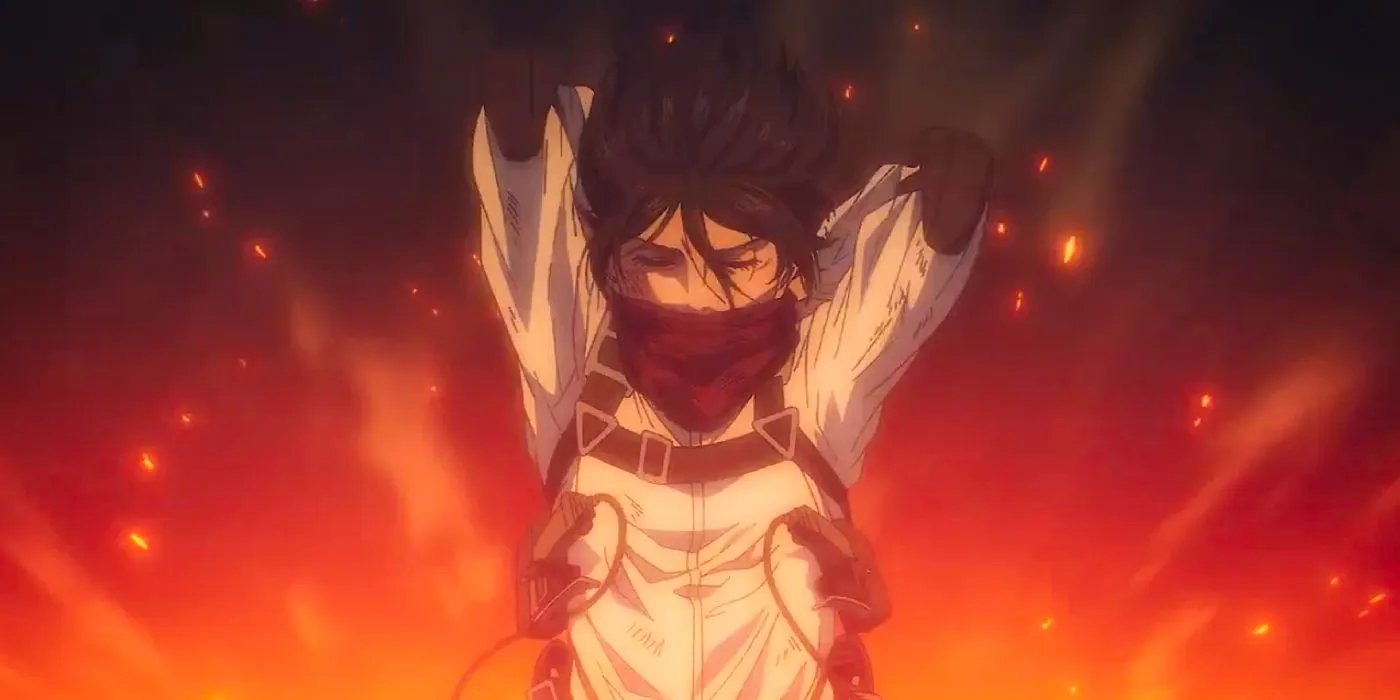 Attack On Titan's Mikasa launches through the air as she ties her scarf around her mouth, fire glowing behind her. Image