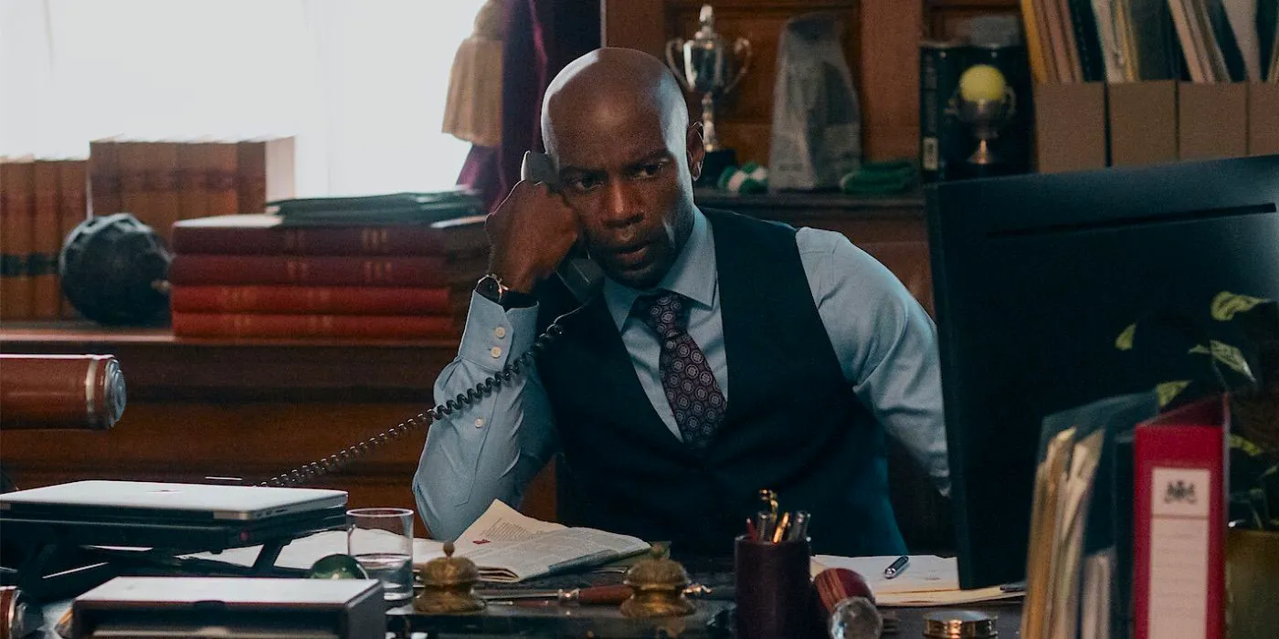 Austin (David Gyasi) talks on the phone in The Diplomat Image