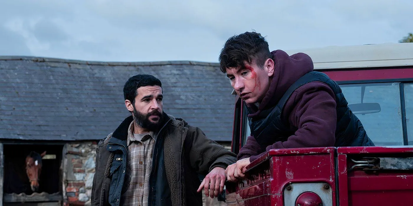 Barry Keoghan looks intense next to another man in Bring Them Down still Image