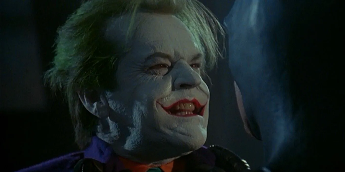 batman 1989 Jack Nicholson as the Joker snarling at Batman on the roof Image