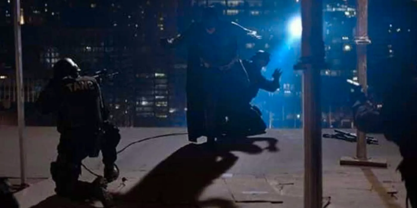 Batman fights SWAT officers in The Dark Knight Image