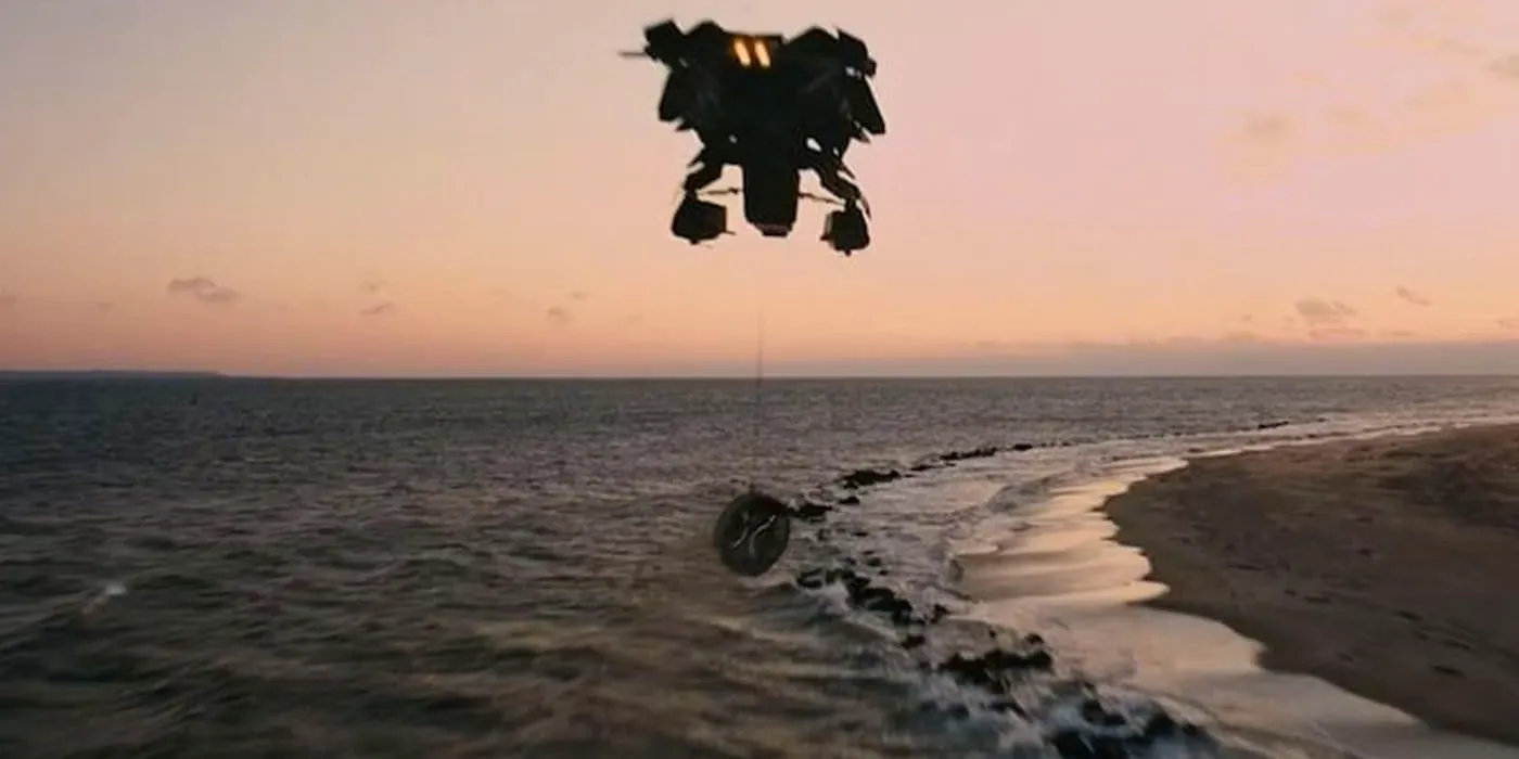 Batman flies away with the bomb in The Dark Knight Rises Image