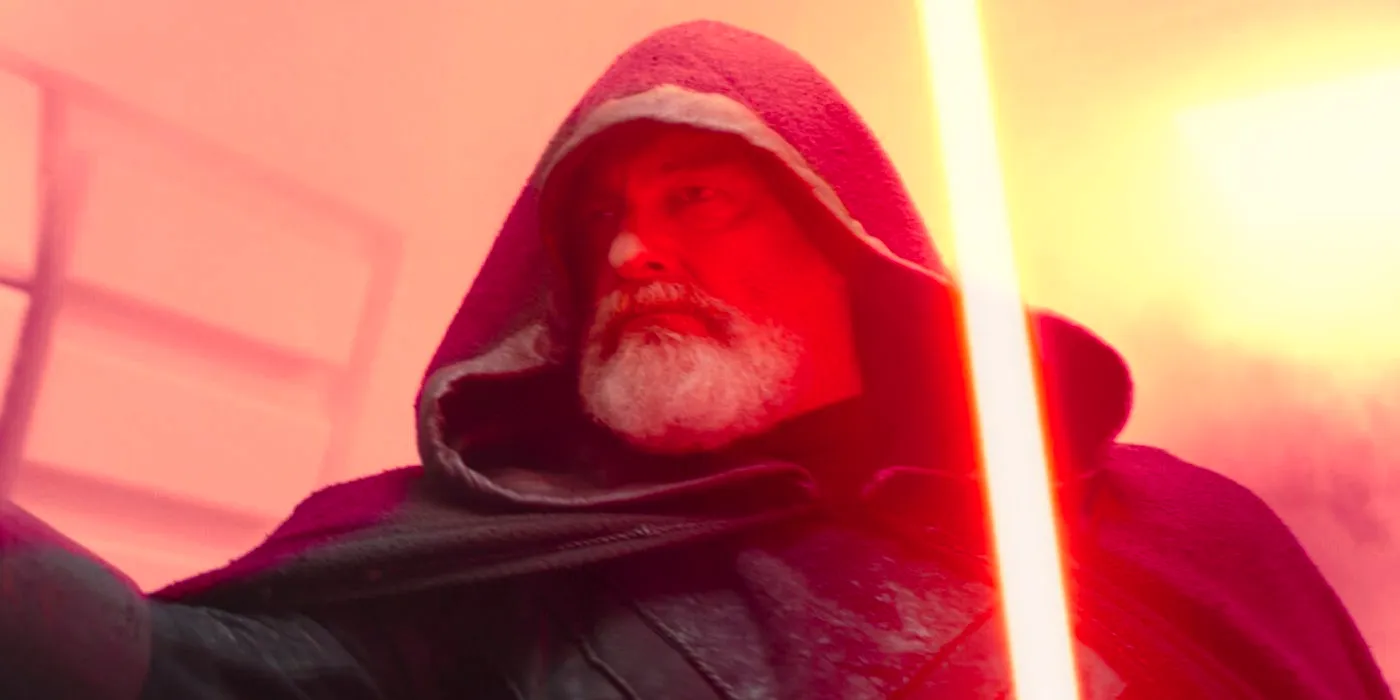 Baylan Skoll wearing a black hood and wielding his lightsaber in Ahsoka Image