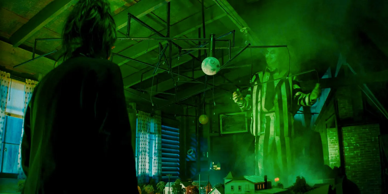 Beetlejuice (Michael Keaton) appears before Lydia Deetz (Winona Ryder) in Beetlejuice 2 Image