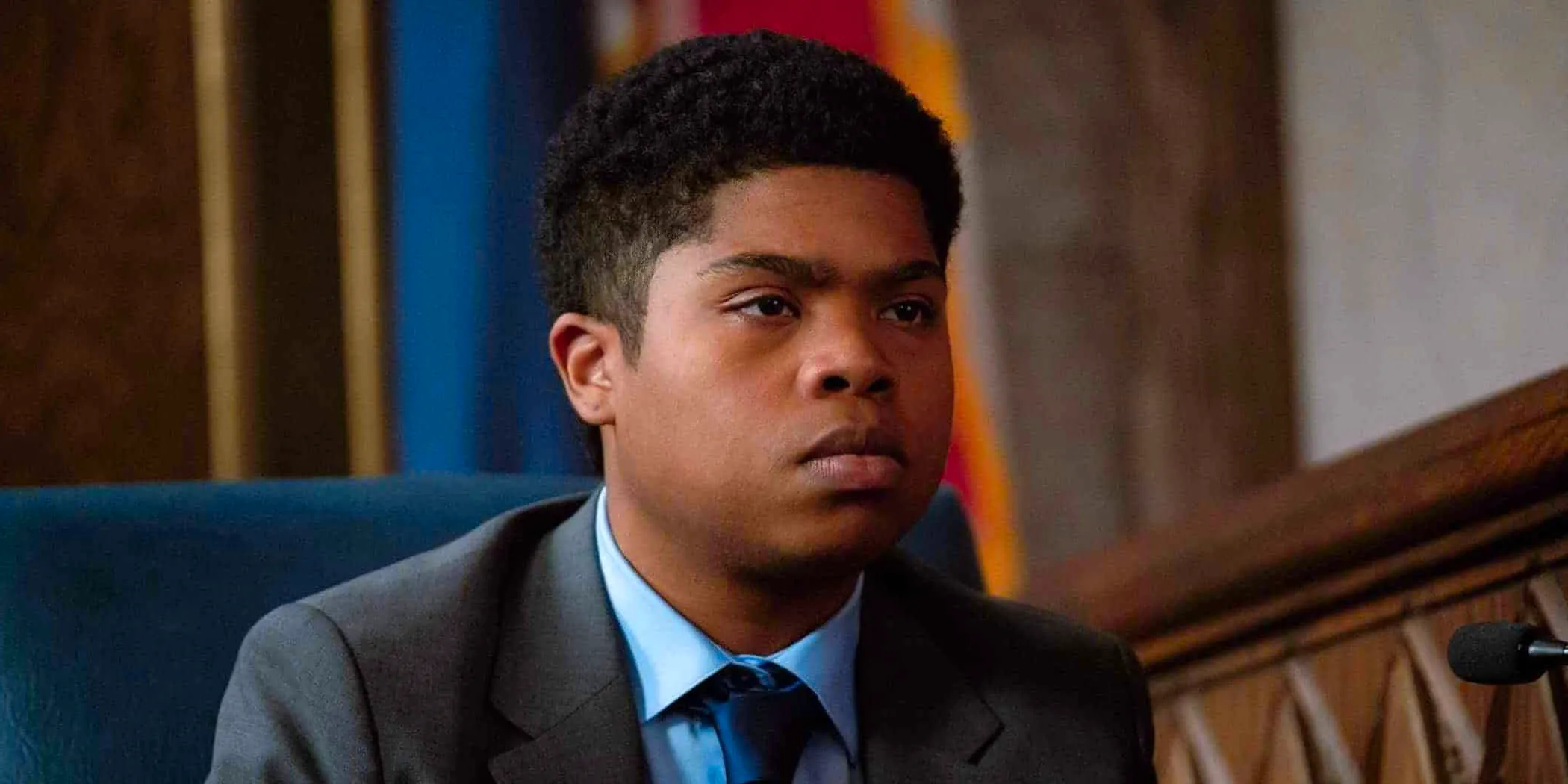 Benjamin Flores Jr. as Eugene Jones standing trial in Your Honor Image