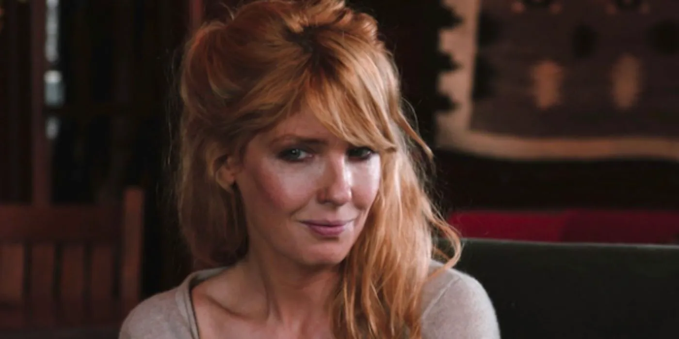 Beth Dutton (Kelly Reilly) is smiling at somone in Yellowstone. Image