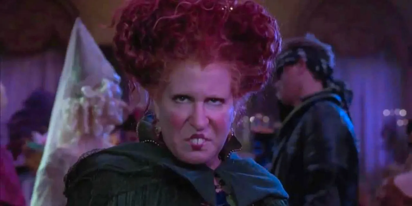 Bette Midler grinning with her teeth out in Hocus Pocus Image