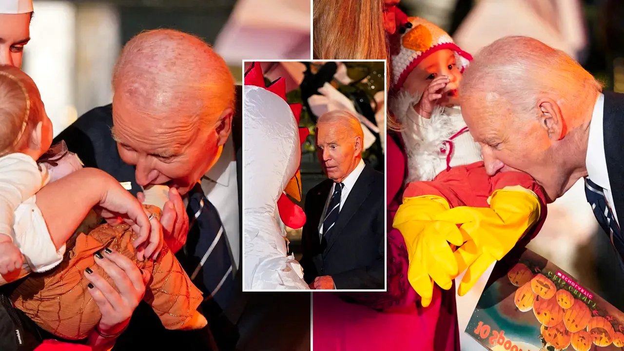 Biden bites babies visiting for White House Halloween trick-or-treat celebration Image